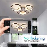 Ceiling light fixture with smartphone showing its reflection, with text 'No Flickering Protect Your Eyesight'.